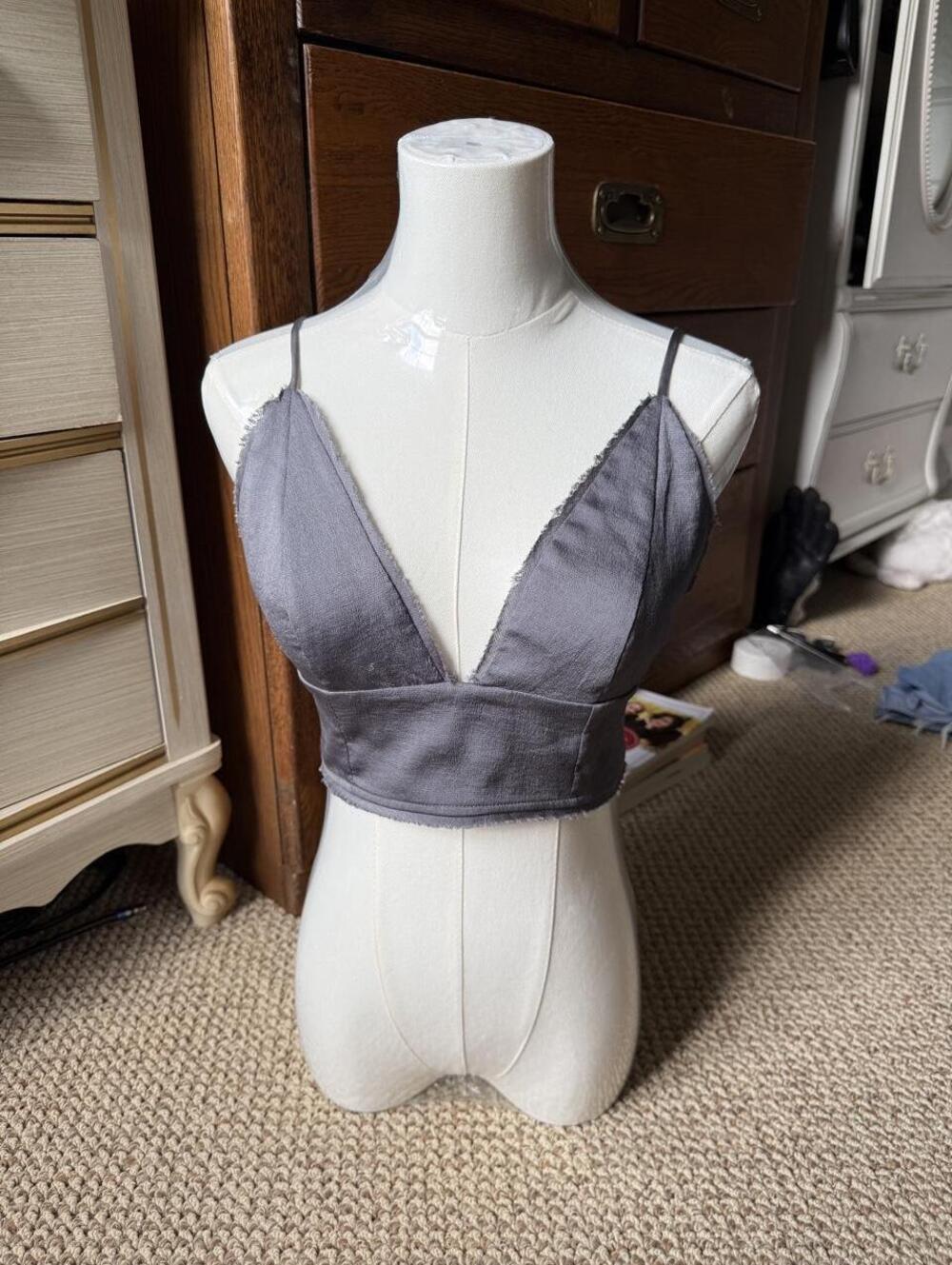 Grey bralette top with a deep v neckline